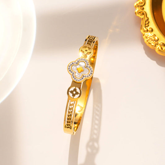 Elegant Floral Titanium Steel Bangle