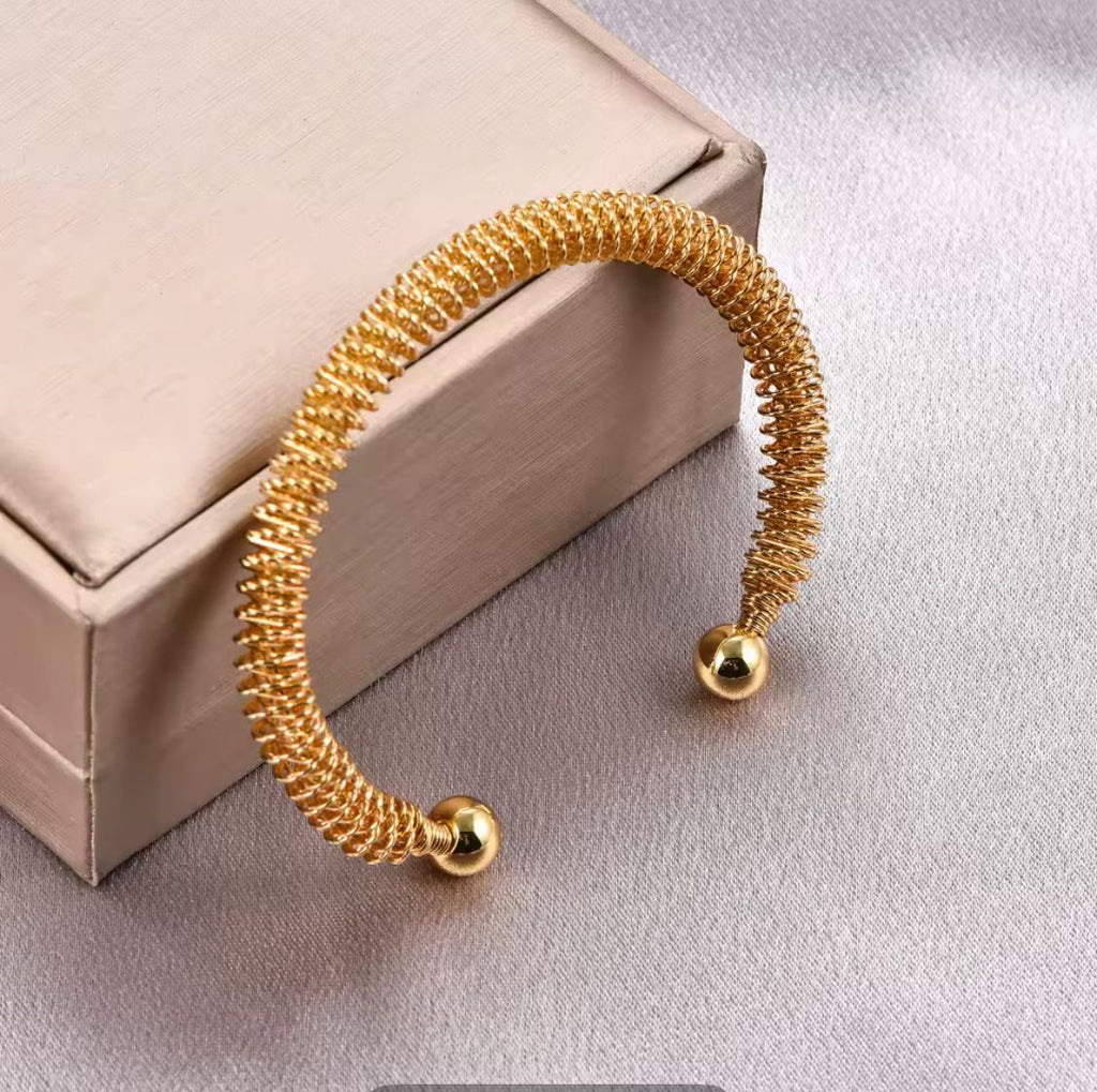 Luxury Twist 24K Gold Color Bangle
